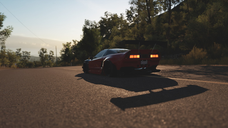motor vehicle, sunny, Rocket Bunny, video games, outdoors, nature, sign, 2K, plant, tree, forza horizon 3, city, road, 2K, no people, surface level, selective focus