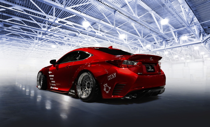 tuning, coupe, land vehicle, indoors, ceiling, illuminated, pattern, shiny, red, stationary, transportation, mode of transportation, speed, no people, motor vehicle