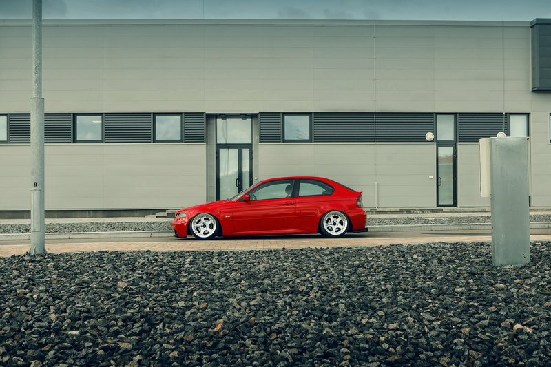 BMW E46, mode of transportation, BMW 3, land vehicle, outdoors, transportation, luxury, stationary, built structure, motion, wall - building feature, architecture