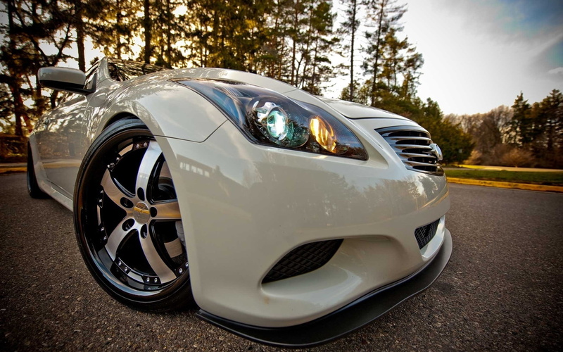 wheel, motor Vehicle, status Car, front View, outdoors, engine, shiny, technology, coupe, street, silver colored, chrome, alloy Wheel, sports Car, transportation