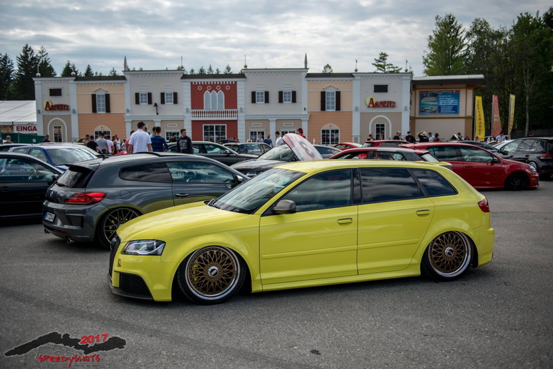 built structure, transportation, incidental people, yellow, road, land vehicle, Volkswagen, street, building, mode of transportation, tuning, car, city