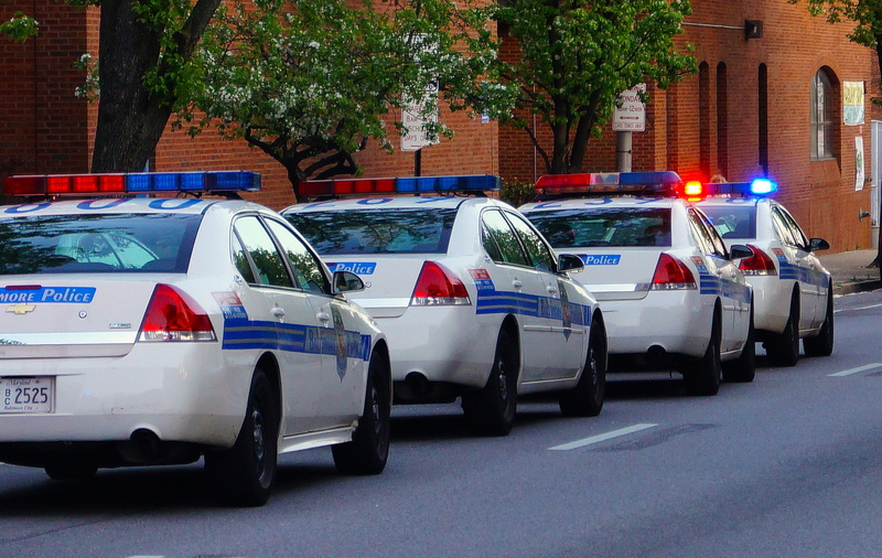 stationary, 2K, in a row, police officer, baltimore, street, building exterior, outdoors, police car, police, car, policemen, motor vehicle, motion, law