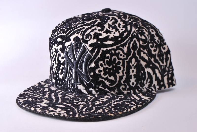 pattern, black color, design, no people, craft, porcelain, indoors, cap, ceramics, floral pattern, cut out, decoration, close-up, single object, hat, new era