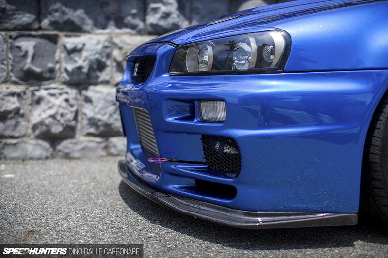 stationary, street, bumper, silver colored, car, blue, headlight, transportation, old, purple, city, architecture, no people, mode of transportation, outdoors