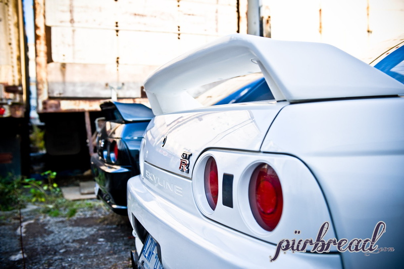 mode of transportation, stationary, travel, city, outdoors, road, traffic, garage, car, tire, wheel, motor vehicle, transportation, white color, nissan nissan skyline gt r r33 nissan skyline r32 nissan skyline gt r r34 nissan skyline gt r r35 car