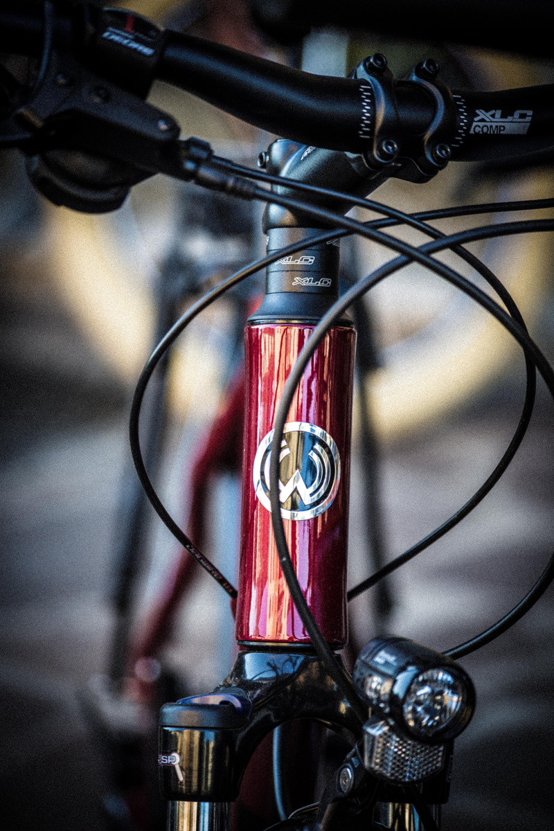 focus on foreground, bike, motorcycle, pedals, sport, wheels, day, indoors, bicycles, mountain bikes, mode of transportation, single object, transportation