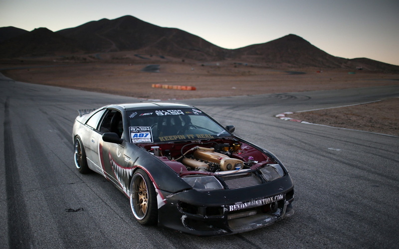 Nissan 300ZX, scenics - nature, road, transportation, nature, mountain range, mode of transportation, land, sky, non-urban scene, no people, day, motor vehicle