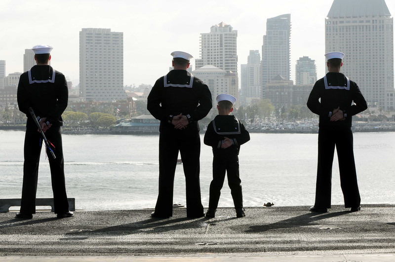 boy, black, togetherness, street, men, nautical, security Guard, day, real people, son, built structure, building, child, man, skyline, father, seamen