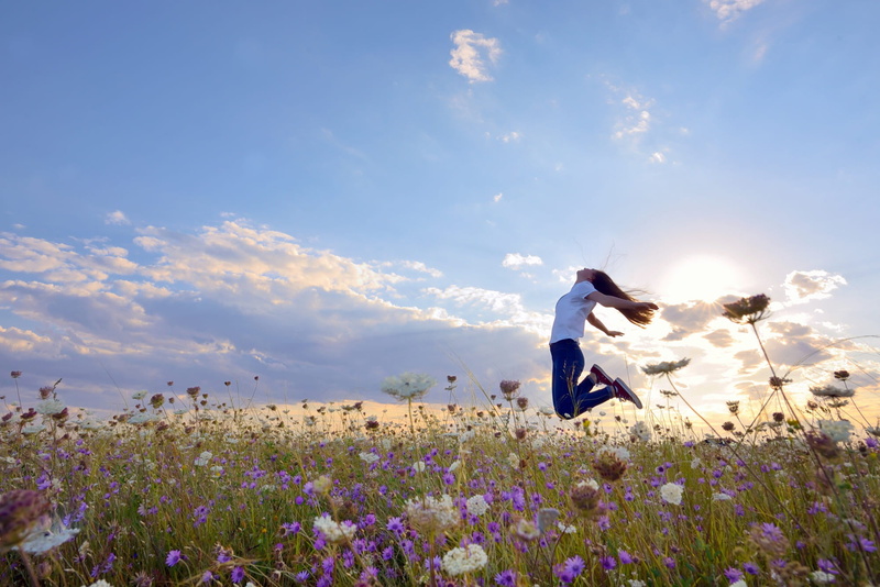 flowers, the sky, positive, light, against the sky, happiness, summer, girl, meadow, in the air, joy, clouds, jump, emotions, the sun, jumping, jumped