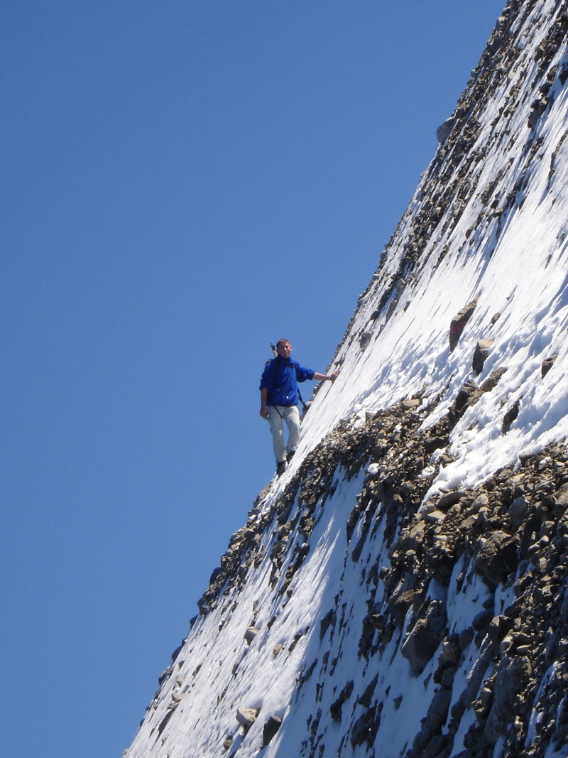 mountains, real people, winter, lifestyles, 1080P, climb, mountain hike, clear sky, snow, skill, adventure, climbing, mountain range, sky, low angle view