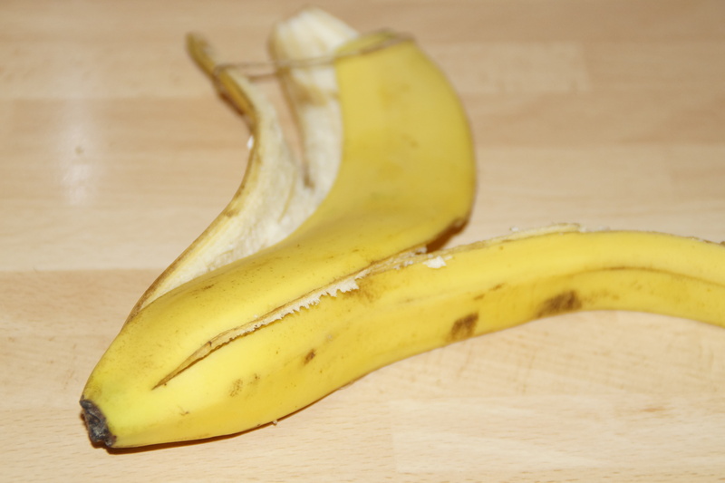 empty, indoors, floor, food and drink, focus on foreground, rest, healthy eating, ripe, eaten up, food, snack, wood - material, fruit, banana, waste, close-up