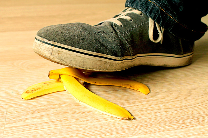 danger, healthy eating, indoors, fruit, banana, people, close-up, banana peel, hardwood floors, shoe, yellow, person, wood - Material, peel, leather, dress shoe