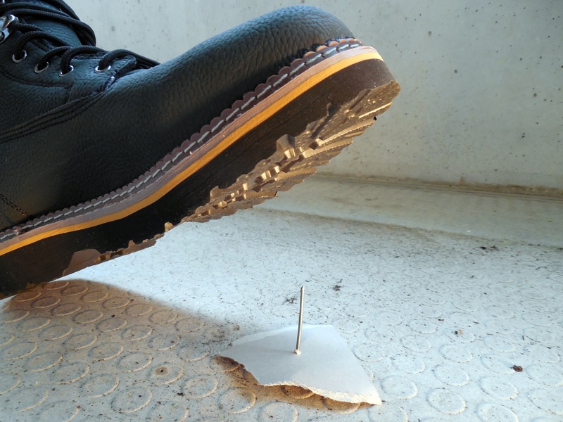 high angle view, wall - building feature, close-up, work clothes, black color, 2K, nature, photo, risk, table, shoe, metal, painful, architecture, accident