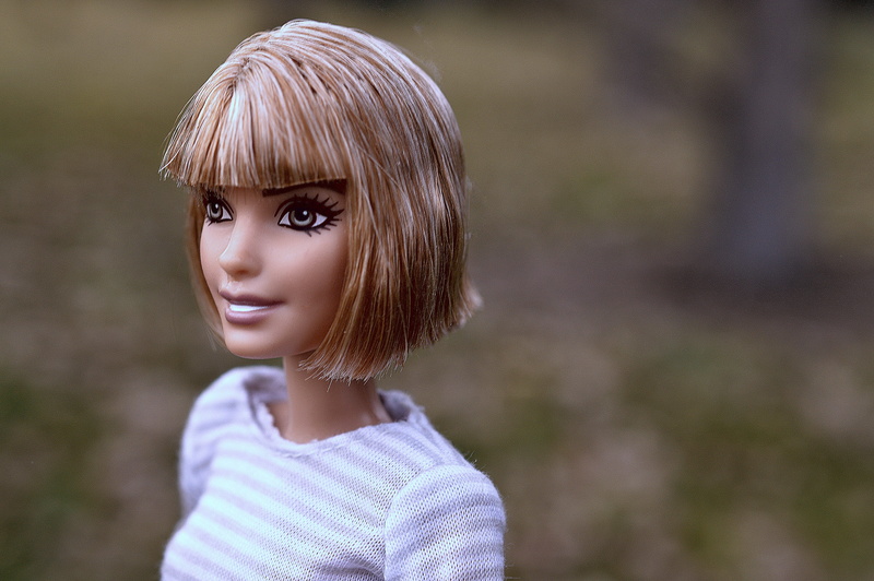 innocence, model, hair, beauty, body part, glamour, one person, blonde, fringe, toy, childhood, front view, fashion, haircut, casual clothing, looking at camera