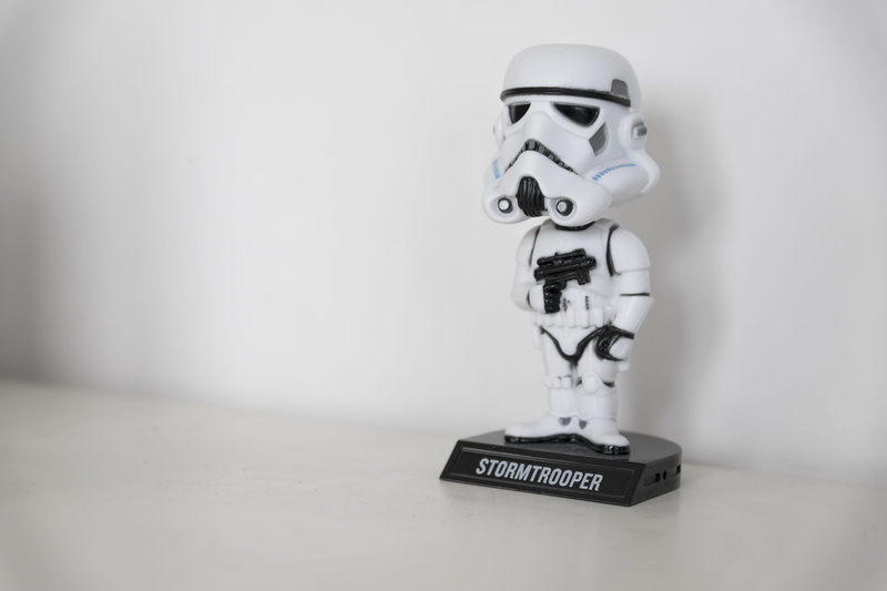 no people, wall - building feature, copy space, savings, human skeleton, star wars, 5K, bobblehead, close-up, technology, table, bobble head, figure, white