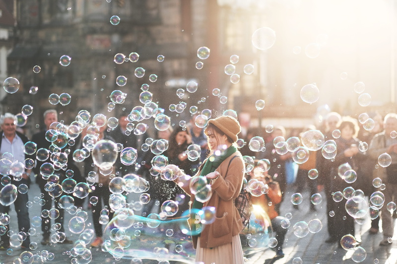 looking, standing, woman, childhood, smiling, joy, emotion, males, spontaneou, females, happiness, adult, people, child, blowing, day, girls, bubbles, fragility