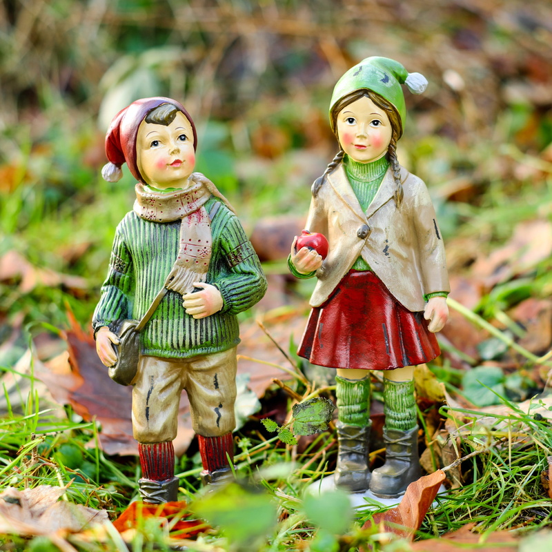 male likeness, hat, childhood, winter, children, female likeness, plant, people, representation, cold, cute, doll, green, out, standing, 2K, figurine