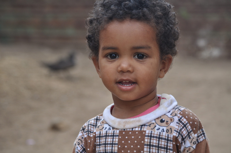 casual clothing, front view, real people, flowers, morocco, human face, day, portrait, 4K, focus on foreground, smiling, innocence, close-up, girl, leisure activity