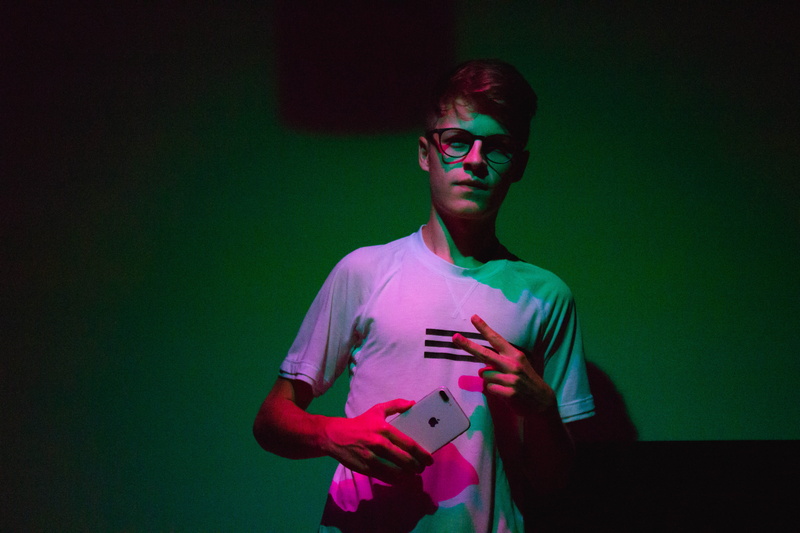 cell phone, purple, music, long sleeve, portrait, stuttgart, looking at camera, t-shirt, 5K, young adult, arts culture and entertainment, apparel, studio shot