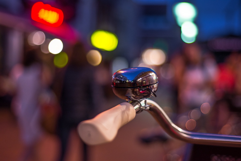 focus on foreground, incidental people, steer, crowd, urban, 5K, photo, handlebar, finger, skill, adult, bokeh, lights, illuminated, city, arts culture and entertainment