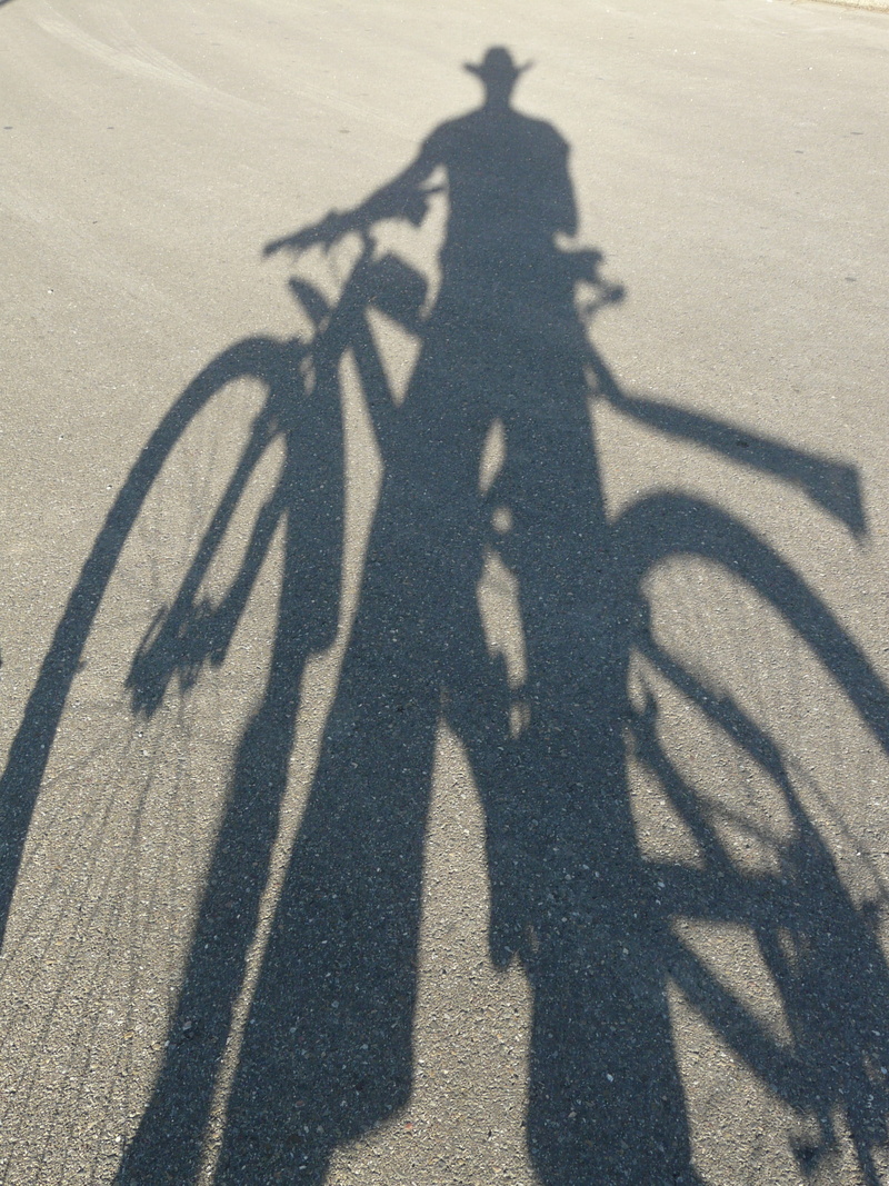 men, land vehicle, long shadow - shadow, Hispanic, bike, light, person, high angle view, street, real people, cycle, Human, people, shadow, Shadow Play