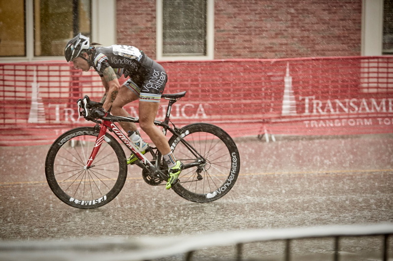Cycling, wall, healthy lifestyle, rain, bike, mode of transportation, one person, lifestyles, full length, Girls, road, day, architecture, race, profile