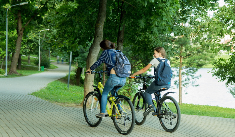 road, males, bicyclist, euro, person, healthy, biking, people, cyclist, transportation, man, riding, fashion, teenager, ecological, women, city, plant