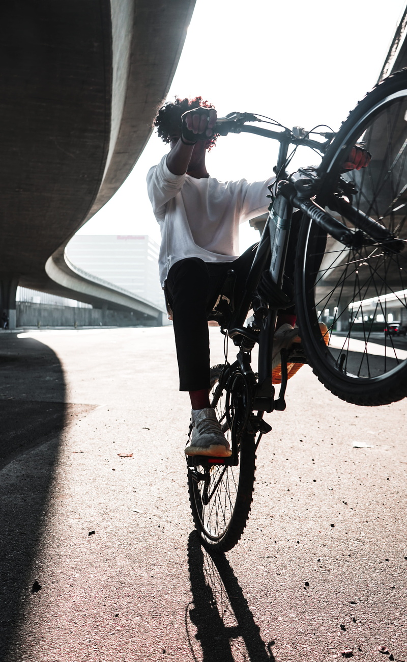 one person, land vehicle, man, architecture, outdoors, street, 5K, perspective, mode of transportation, lifestyles, teen, leisure activity, shadow, day