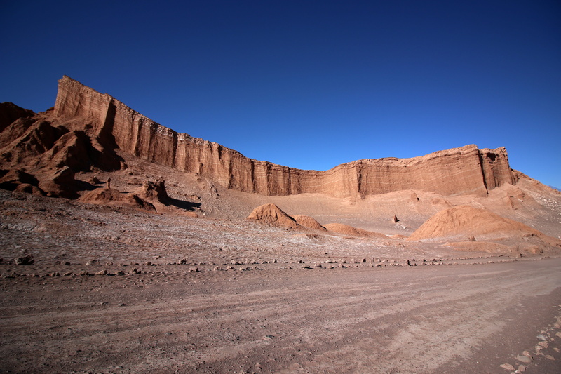 non-urban scene, mountain, no people, nature, environment, mountain range, outdoors, beauty in nature, sky, solid, rock formation, climate, valley
