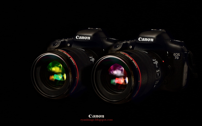 black color, lens - eye, slr camera, industry, indoors, 1080P, EOS 7D, camera, text, photography themes, no people, two cameras, EF 100mm F2.8L macro Hybrid IS