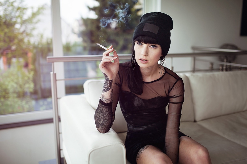 lifestyles, 1080P, beanie, clothing, casual clothing, three quarter length, indoors, sitting, hat, looking, beautiful woman, hairstyle, looking at viewer