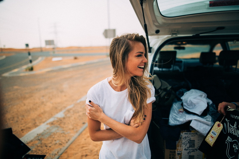 waist up, focus on foreground, André Josselin, leisure activity, real people, casual clothing, lifestyles, outdoors, one person, long hair, day, mode of transportation