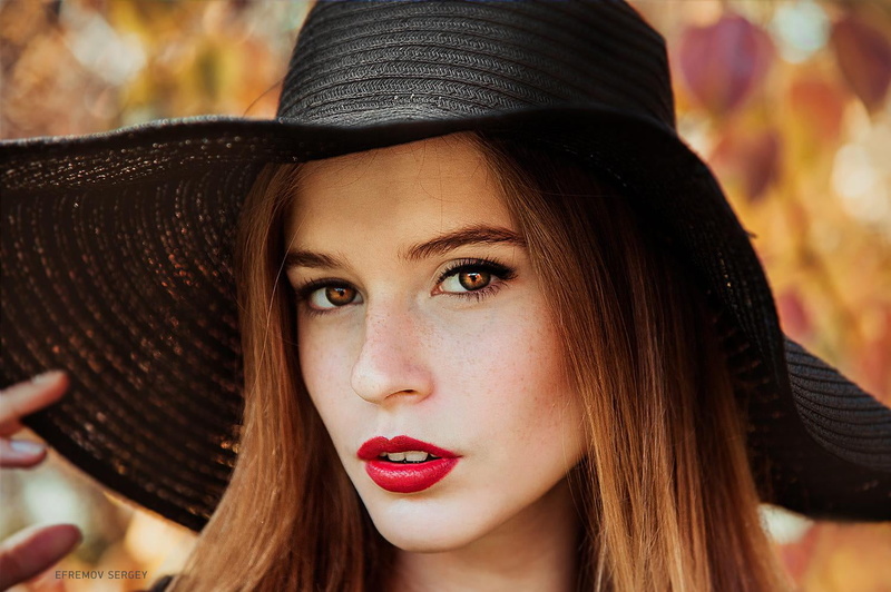 young adult, headshot, beautiful woman, clothing, outdoors, looking at camera, looking at viewer, 720P, hairstyle, long hair, Efremov Sergey, hat, brown eyes