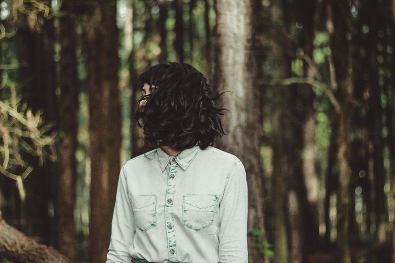 light, style, fashion, washed, girl, trunk, plant, stand, flip, waist up, focus on foreground, one person, still, land, young adult, people, wearing, casual clothing