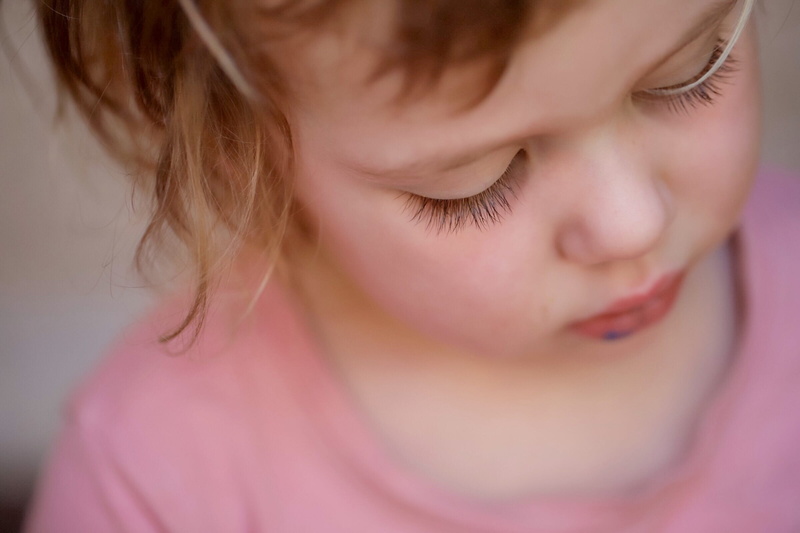 child, one person, hair, parenthood, closeup, eyes closed, emotion, depression - sadness, sadness, face, beauty, looking, pink, close-up, focus, female