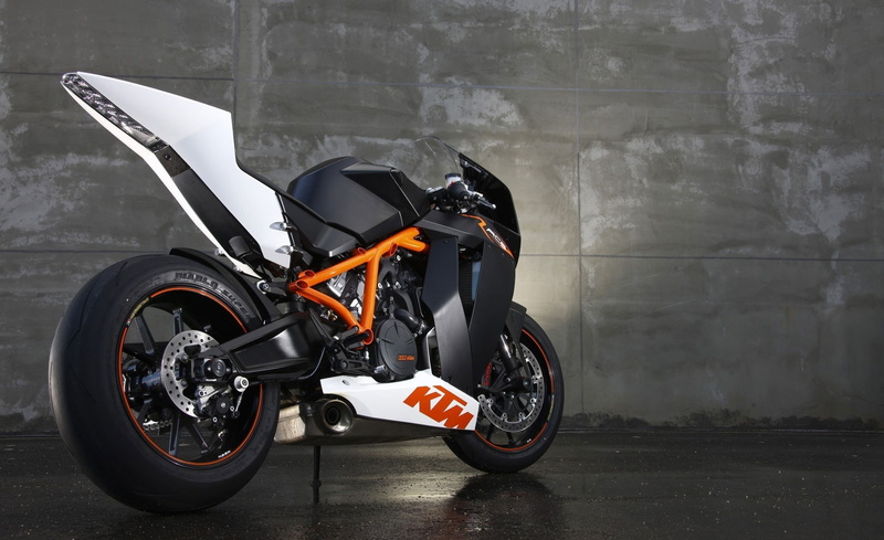 day, mode of transportation, black color, parking, Motorcycle, motor scooter, road, architecture, Other Motorcycles, outdoors, sportmotorcycle, sport, transportation
