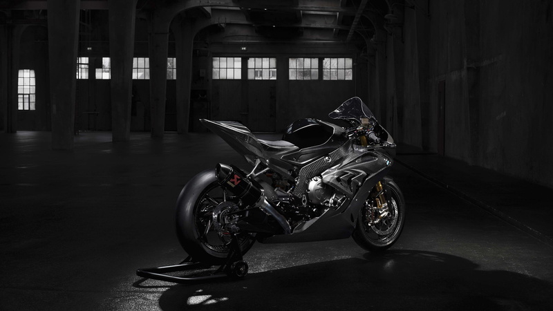 mode of transportation, architecture, single object, ride, no people, motorcycle, absence, travel, city, day, parking, built structure, transportation