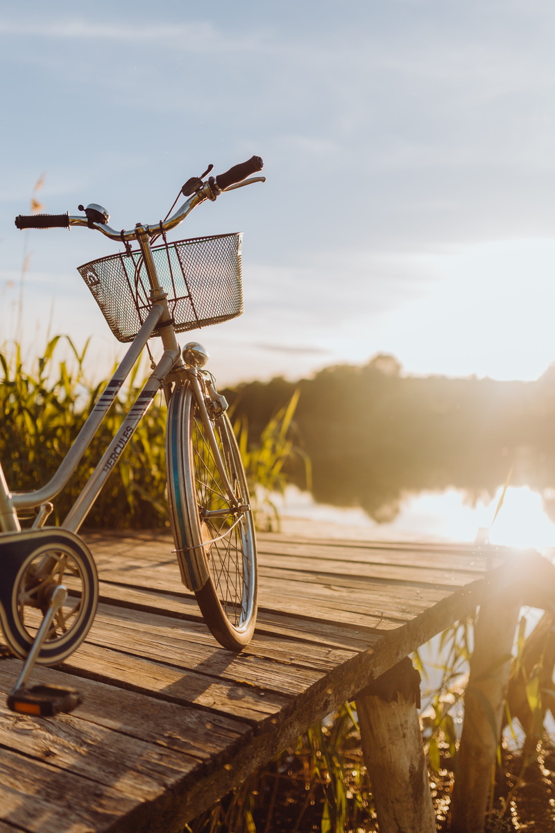 bicycle, bicycle basket, land, vacation, cyclist, stationary, bright, light, container, sunset, sky, outdoor, vacations, no people, transportation, 5K
