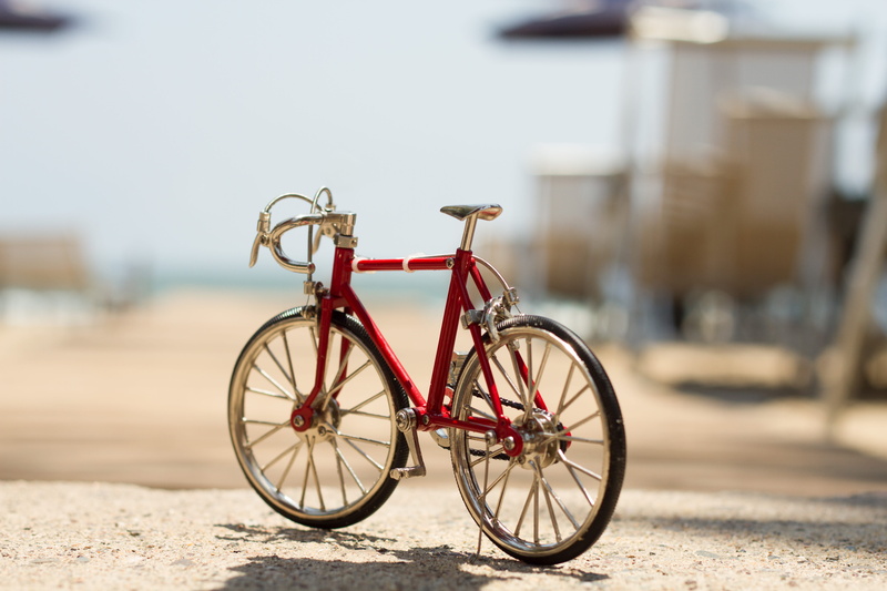 transportation, wheel, beach background, land, outdoors, bicycle, parking, stationary, focus on foreground, mode of transportation, beach bike, mini bike