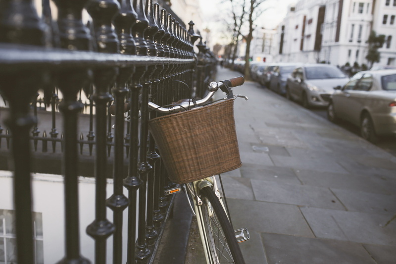 no people, classic, bicycle basket, railing, Street, transportation, 2K, focus on foreground, container, city Life, building exterior, city, urban Scene