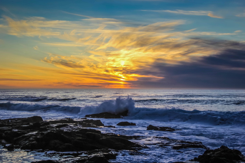 sunset, rock - object, outdoors, near, power in nature, breaking, beauty in nature, sport, blue sea, motion, land, horizon, south africa, beach, water