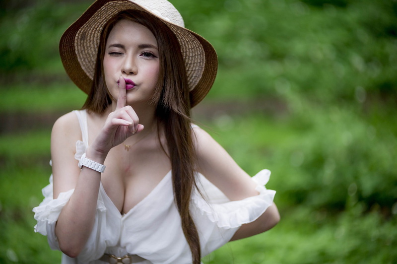 beauty, day, women, hair, leisure activity, Asian, long hair, outdoors, one person, beautiful woman, focus on foreground, young adult, fashion, hat, wink