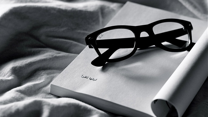 no people, furniture, bed, security, fashion, still life, text, textile, glasses, 720P, two objects, focus on foreground, black, close-up, framed, sheet