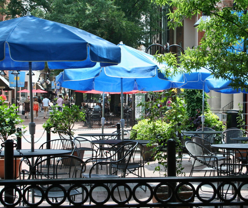 sidewalk restaurant, Restaurant, plant, sunlight, railing, open air restaurant, no people, built structure, cafe, blue, outdoor dining, patio, open air cafe