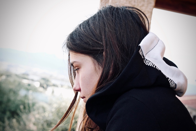 lifestyles, female, long hair, beauty, focus on foreground, one person, lightheartedness, young, hair, young adult, future, outdoors, feeling, hairstyle