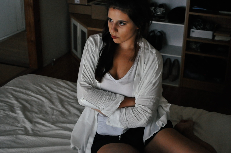 2K, upset, arms crossed, furniture, decor, indoors, room, looking at camera, expression, angry, domestic, portrait, pout, bedroom, contemplation, one person