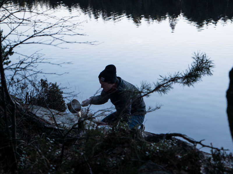 lake, man, river, daytime, men, plant, flask, land, pouting, real people, water, container, lifestyles, one person, outdoors, pouring, sky, day, nature