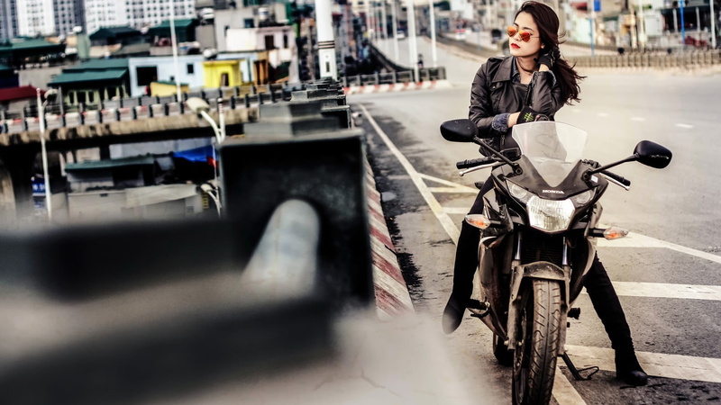 leather jacket, leisure activity, Asian, mode of transportation, red lipstick, adult, casual clothing, one person, outdoors, beautiful woman, city, women