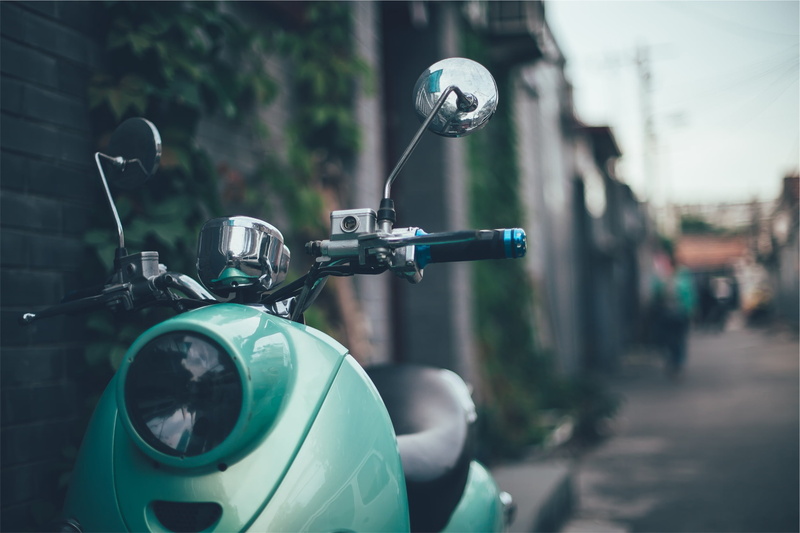 green, scooter, street, old-fashioned, 1080P, land Vehicle, helmet, motorcycle, transportation, old, day, city, travel, architecture, retro, road, focus on foreground
