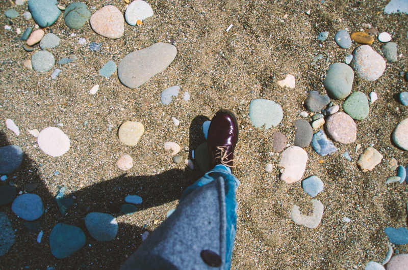 low section, body part, showing, unpaired, land, one person, day, human body part, stones, human leg, 2K, patent, outdoors, lifestyles, high angle view